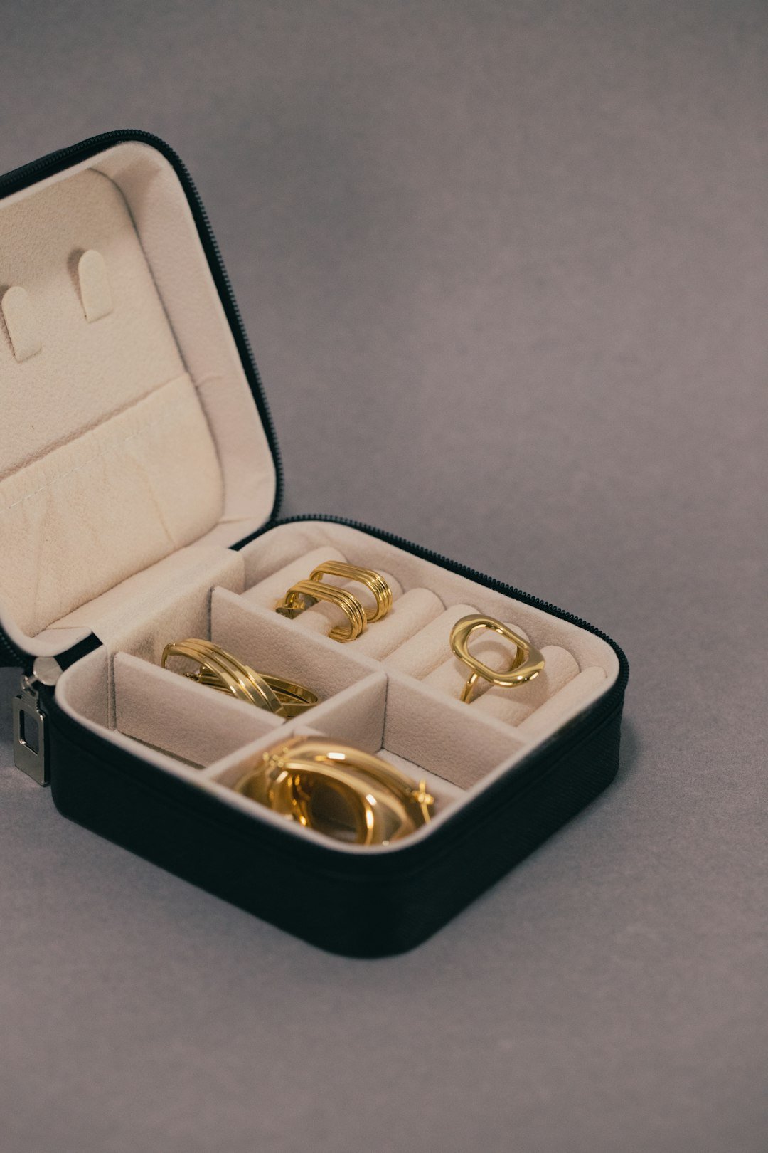 a-black-case-with-six-rings-inside-of-it-re9p9uw3mam