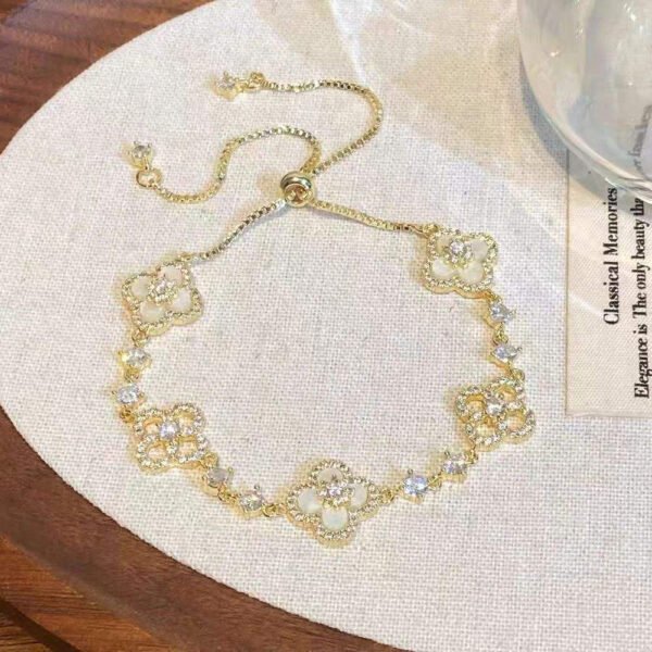 sku 05 gold bracelet with white shells sku 05 gold bracelet with white shells